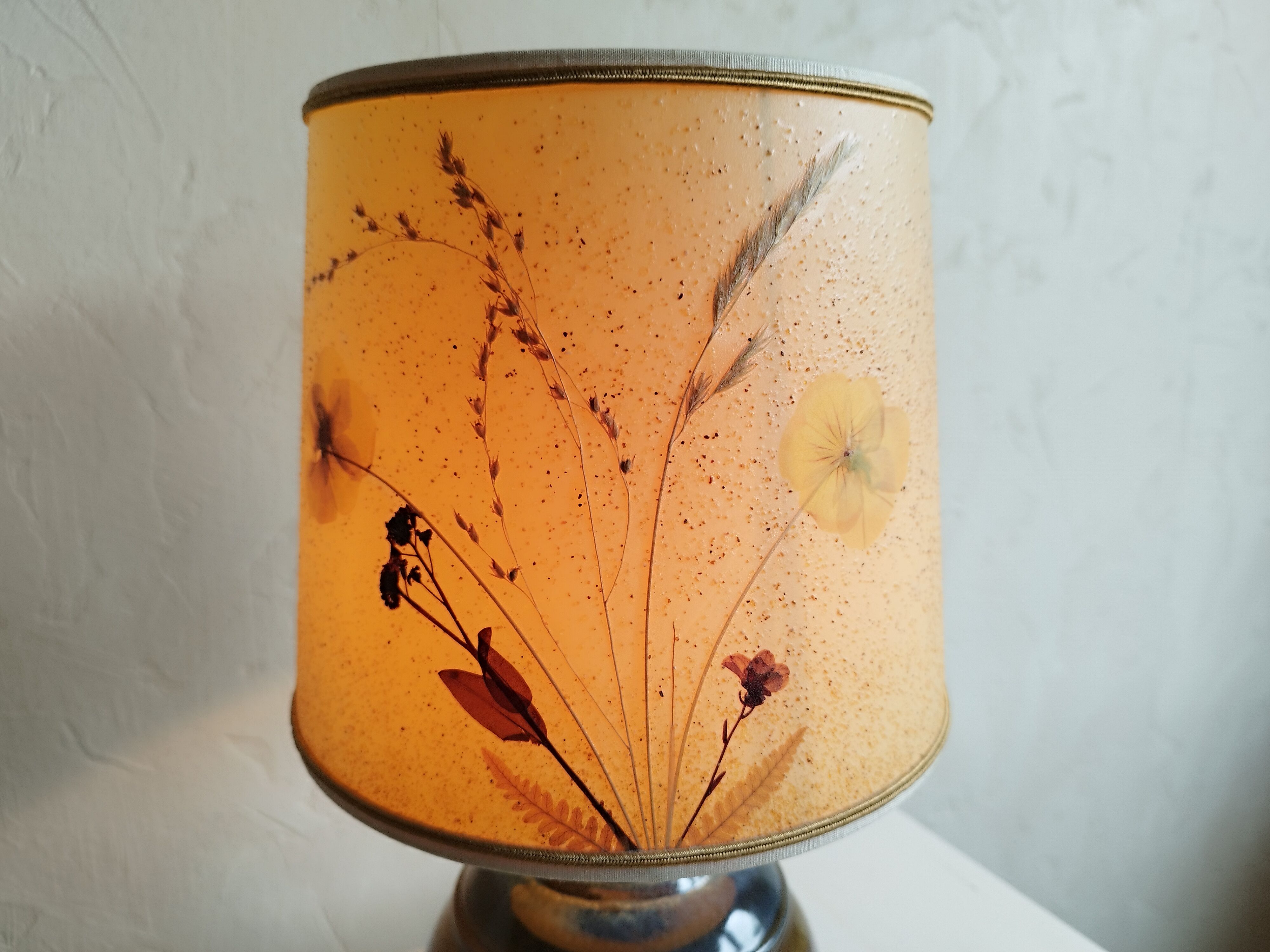 Sandstone lamp and dried flowers
