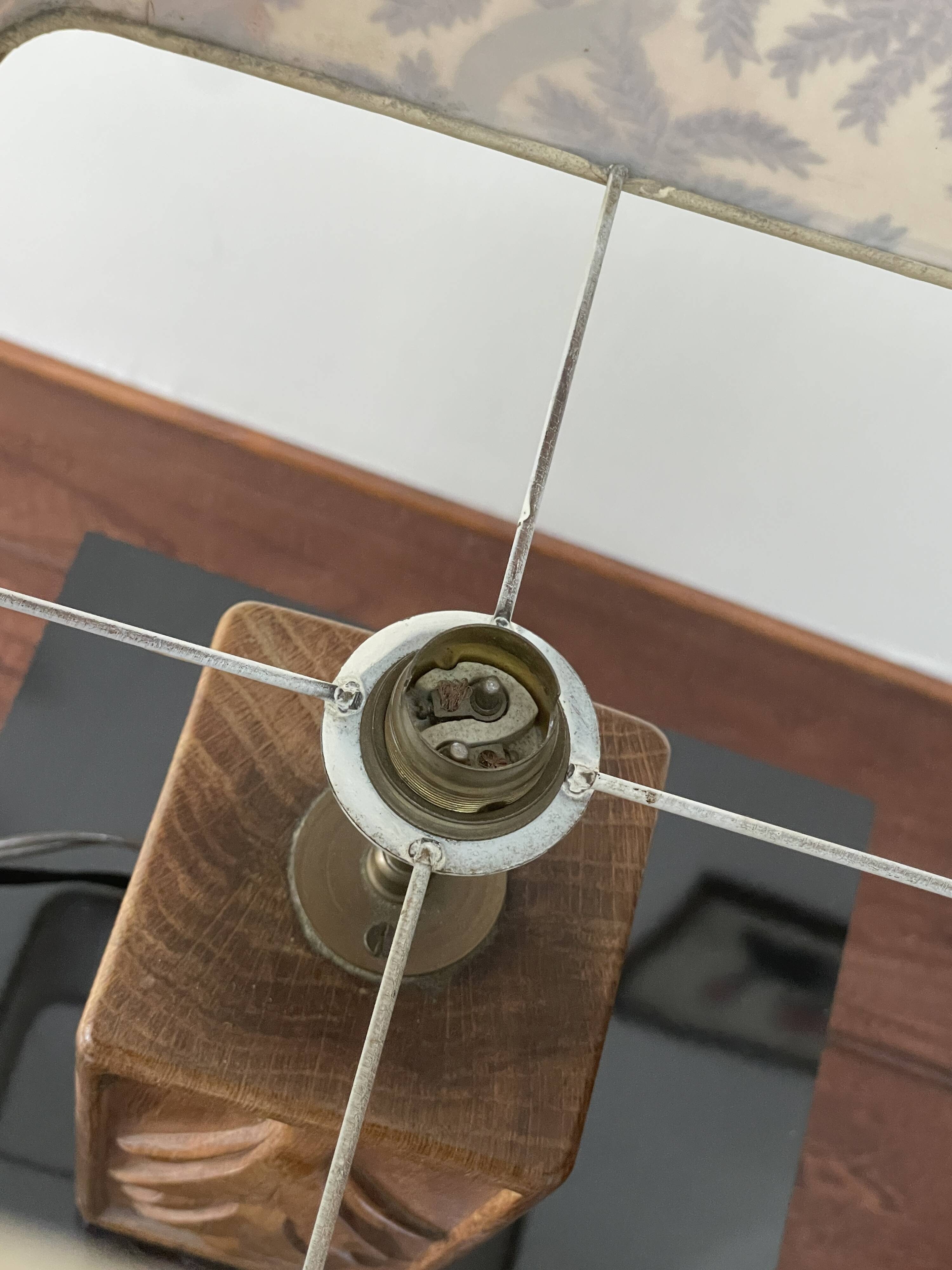 Wooden lamp with carved plant decoration from 1930-50, sold with a 1970 lampshade.