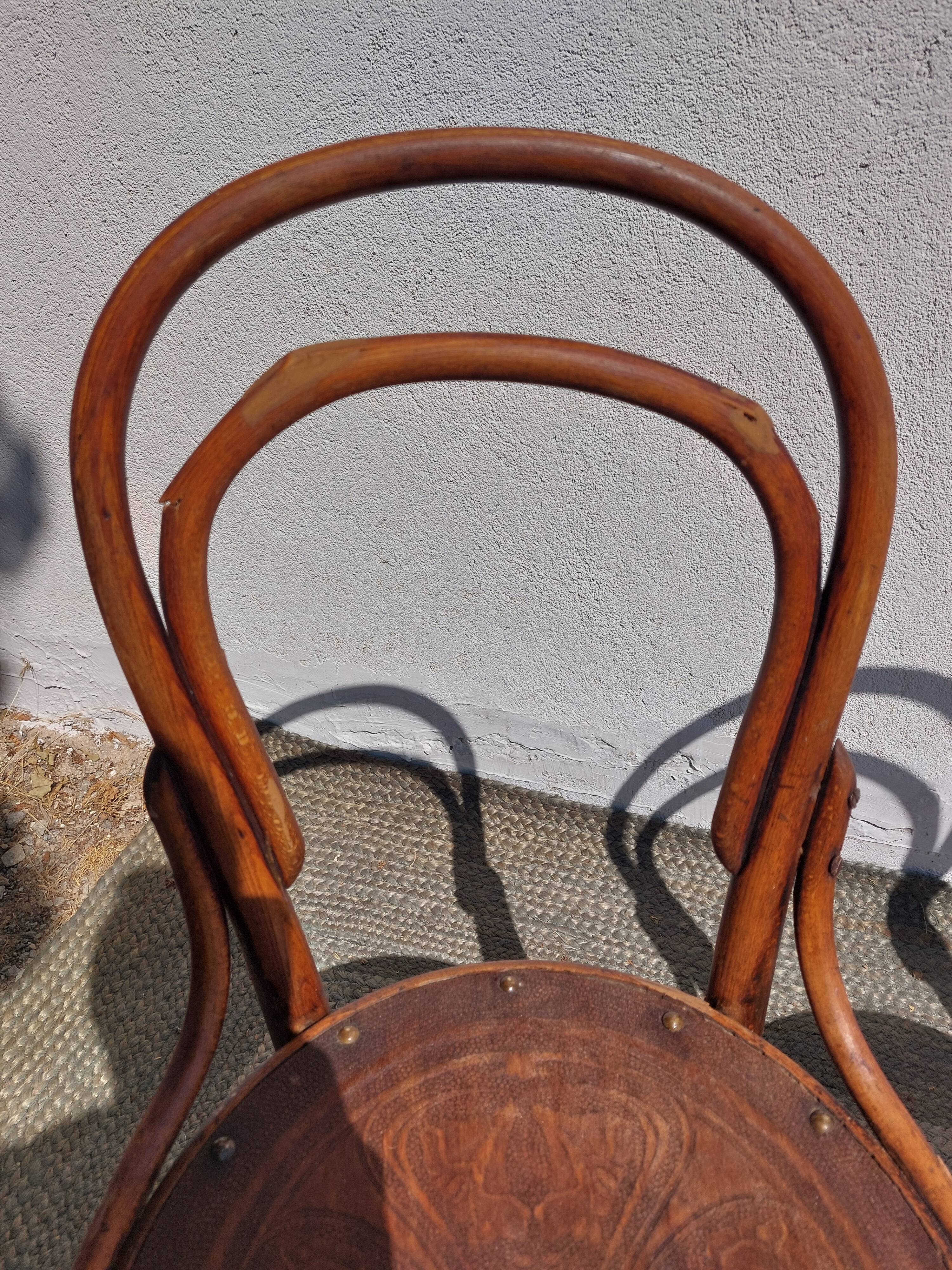 4 curved wooden bistro chairs
