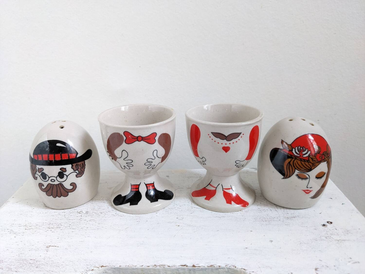 Egg cup, salt and pepper shaker duo