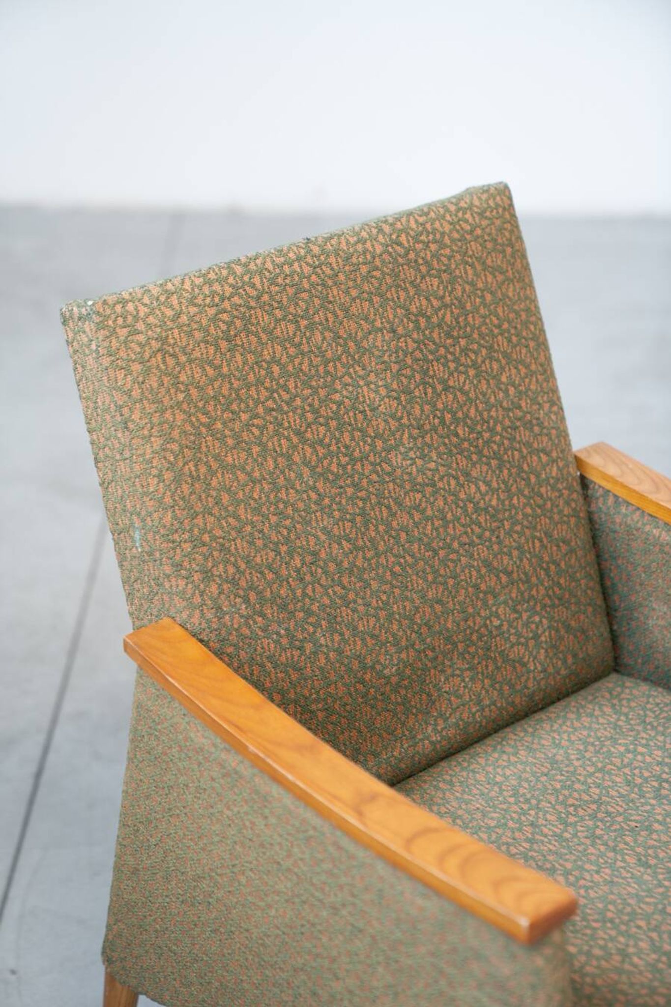 Pair of vintage armchairs in oak and embossed fabric, with old republished certificate of authenticity