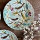 Set of 3 antique plates in majolica with bird designs.