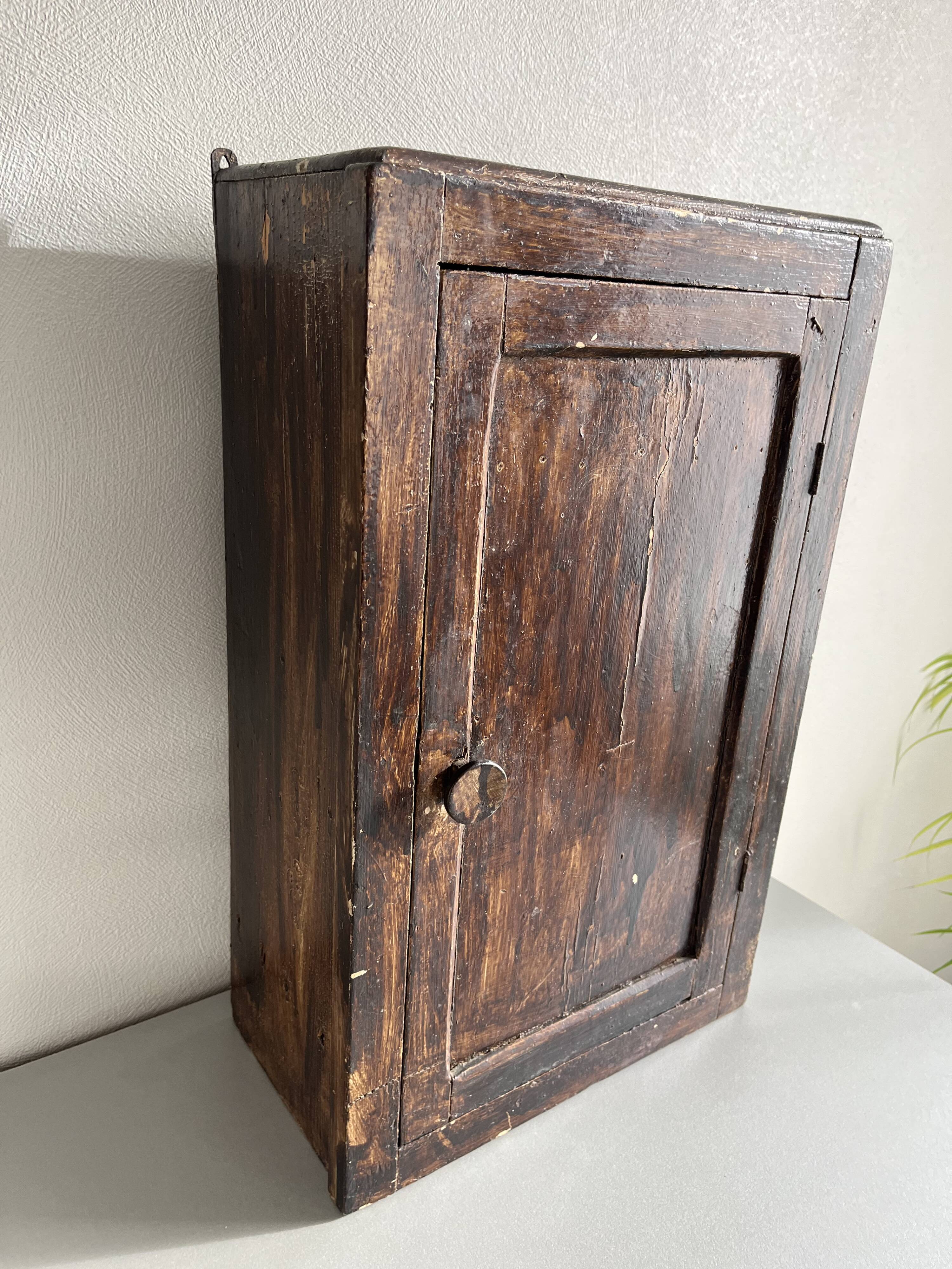 Patinated wooden toilet cabinet / pharmacy