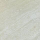 Vintage side table in travertine, circa 1980s.