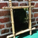 Old mirror in raw wood