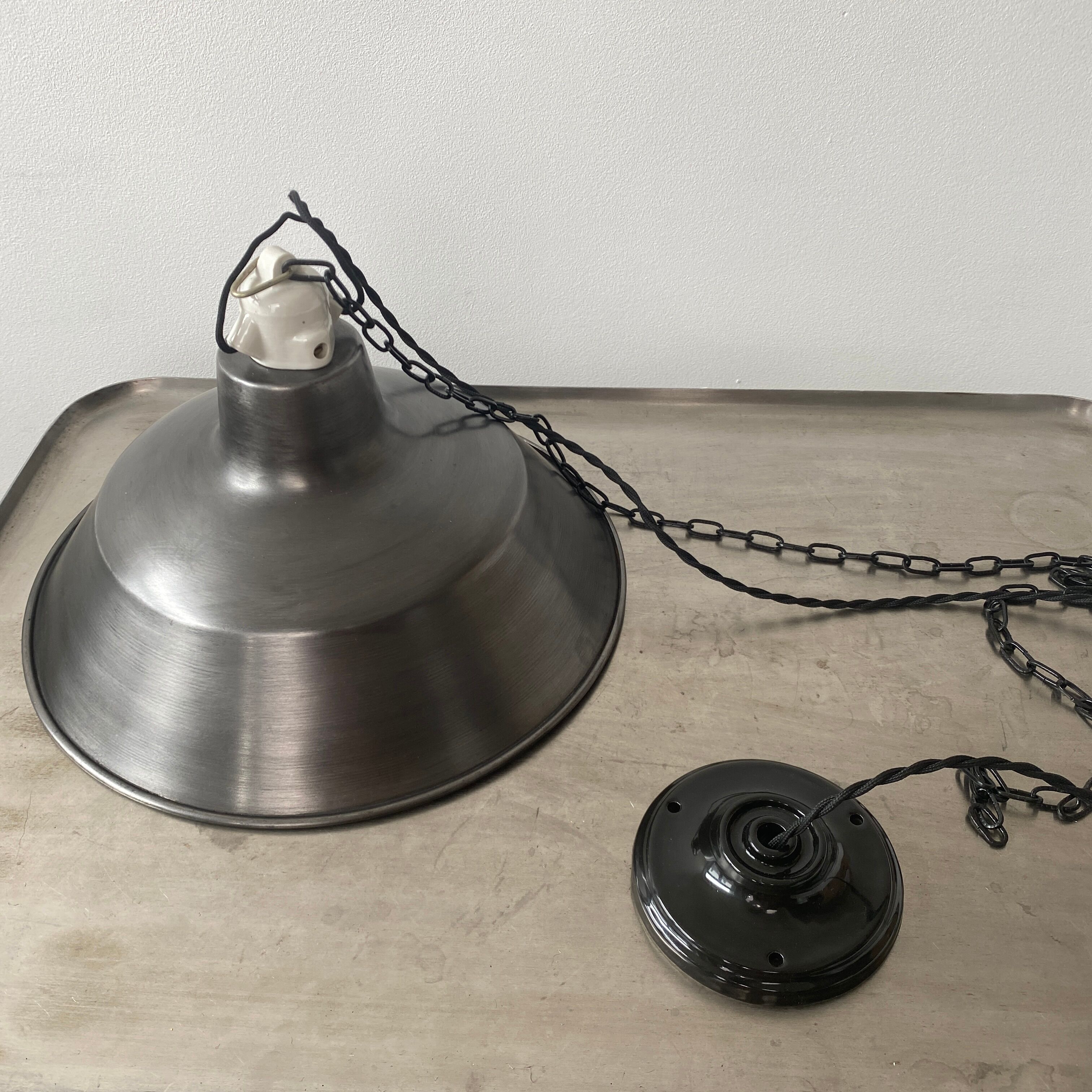 Pair of old industrial steel suspensions