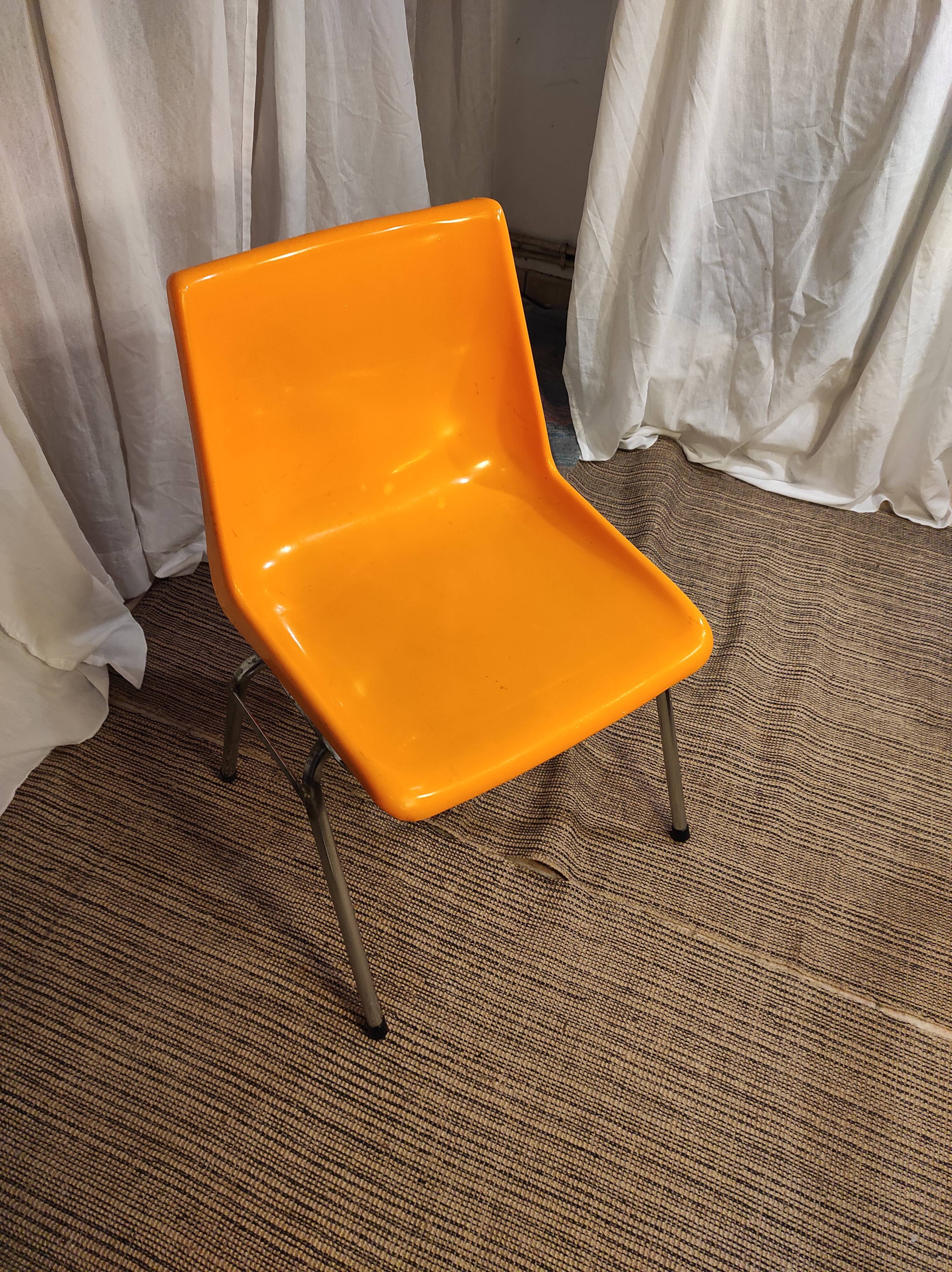 Orange plastic chair 1970
