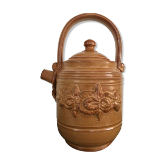 Brown ceramic pitcher with country deco handle