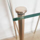 Glass and gilded brass pedestal table, 50s