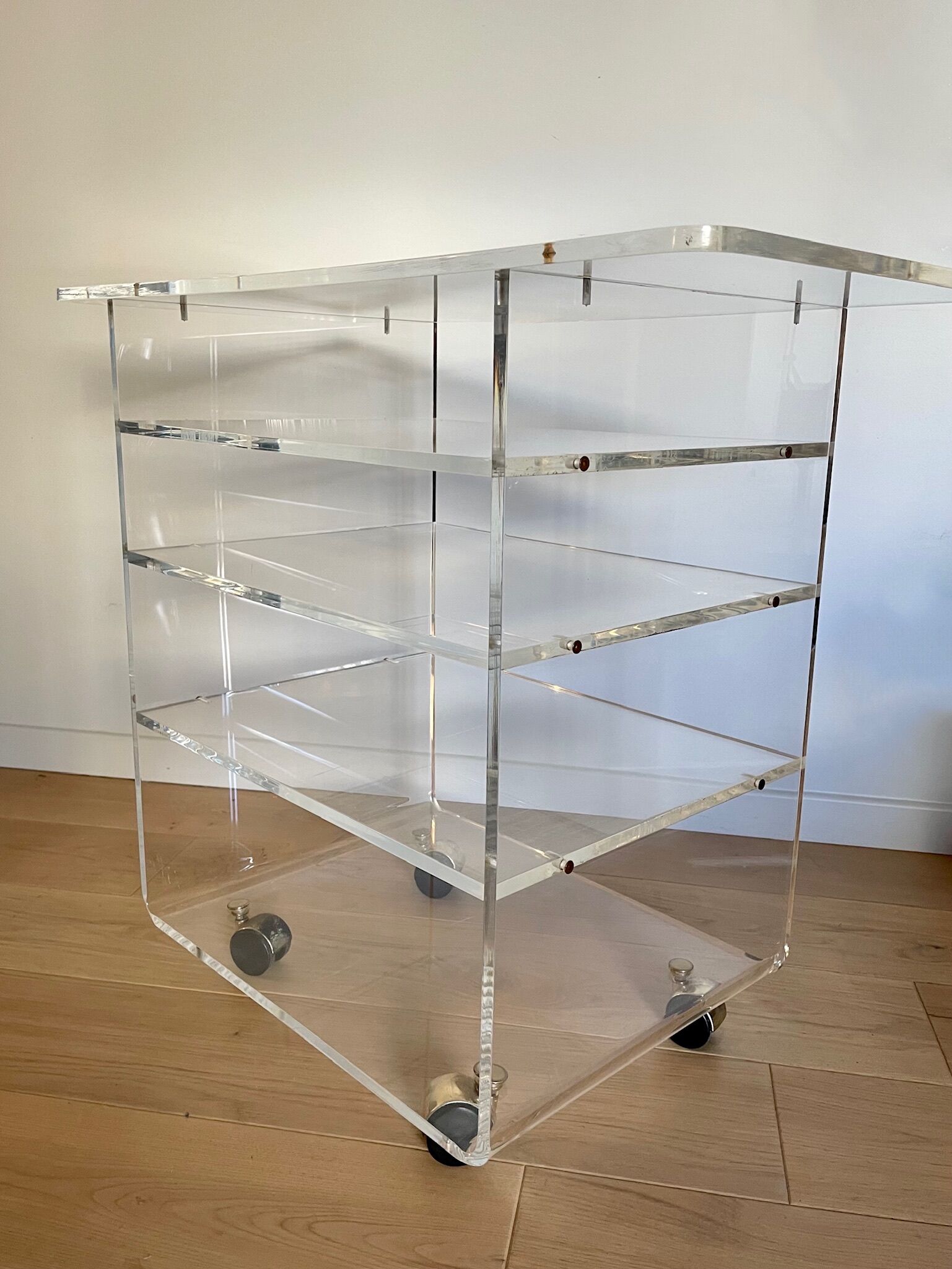 Transparent plexiglass TV stand