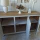 Vintage low sideboard with 3 doors, pearl gray patina, wooden top.