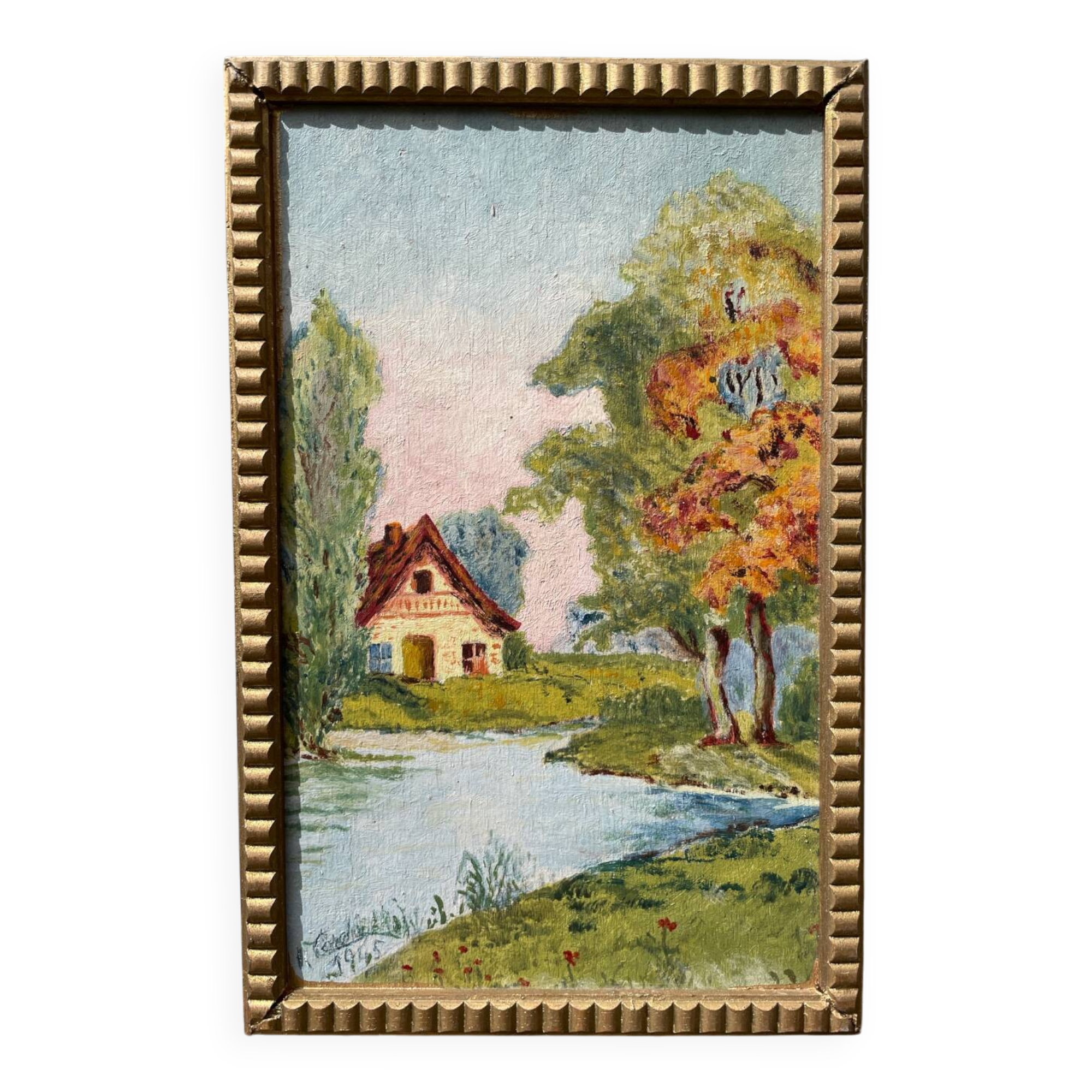 Small landscape painting with golden frame