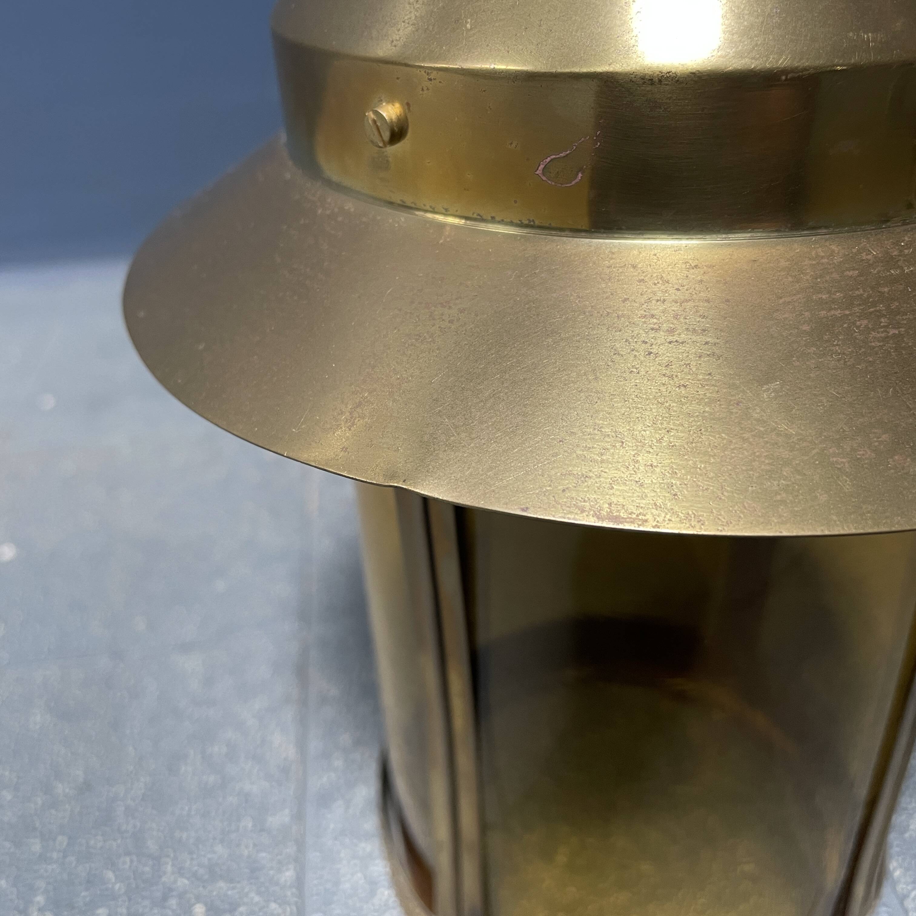 Brass lantern pendant lamp with yellow glass