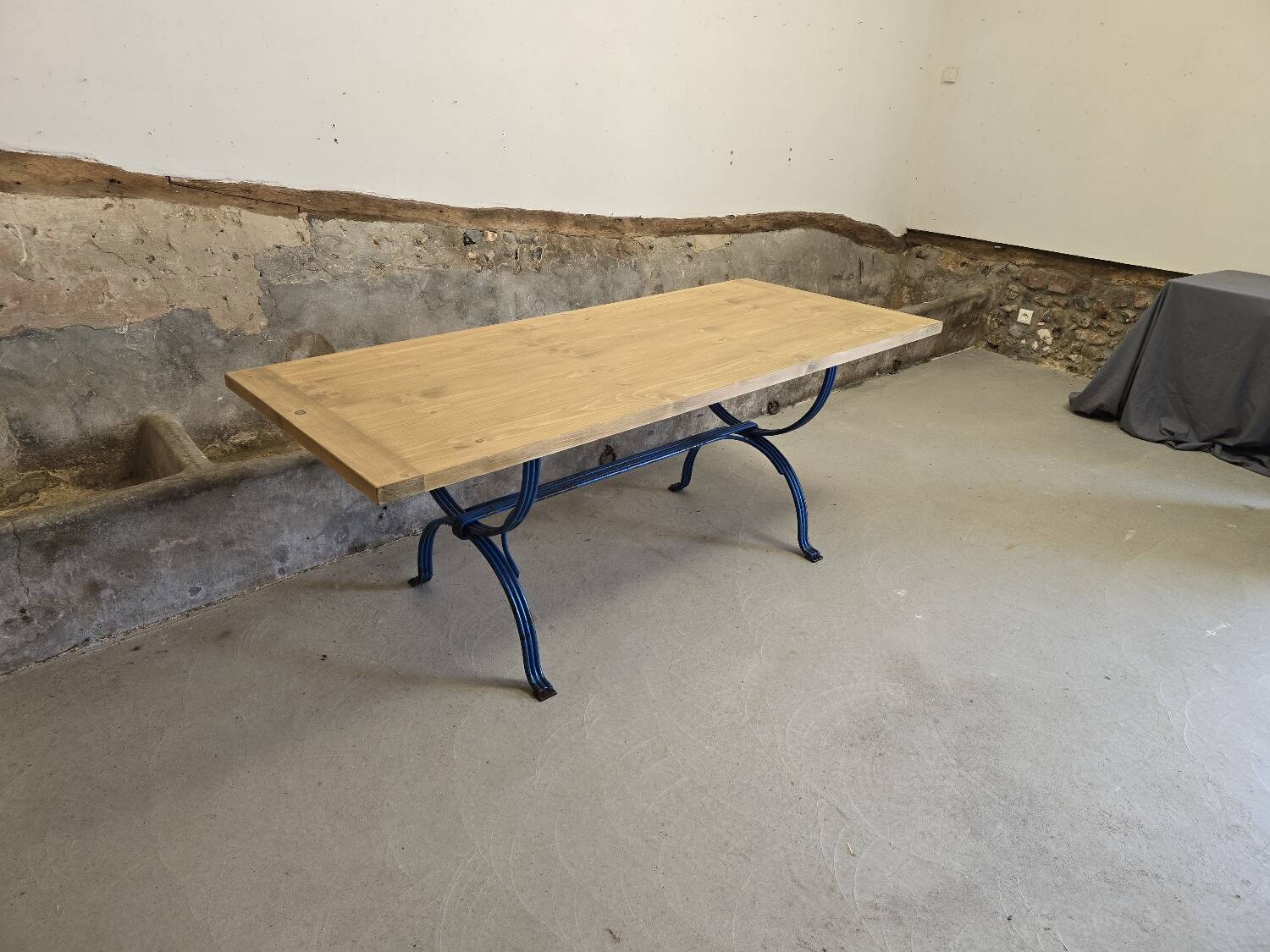 Wrought iron and solid wood table