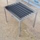 Pair of side tables in chrome metal and glass