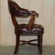 Chesterfield captain's armchair William IV in restored leather with hardwood.