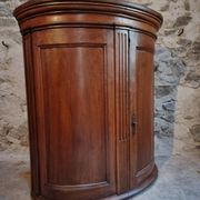 Antique demi-lune cabinet in walnut, late 18th century, French château.
