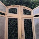 Porte d'entrée cintrée double en chêne, grilles et verre, XIXème