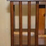 Sheraton Revival rotating library table in walnut and satin wood.