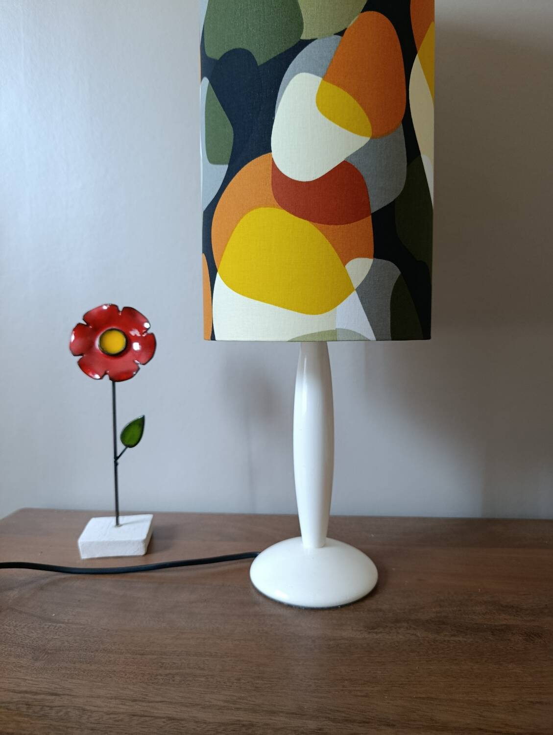 vintage lamp with a white wooden base, multicoloured sixties lampshade