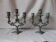 Pair of candlesticks in green-grey patinated metal