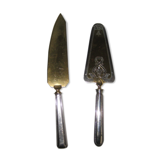 silver metal knife and cake shovel