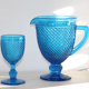 Old table set in blue pressed moulded glass