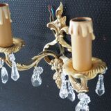 Pair of gilded bronze sconces and crystal pendants