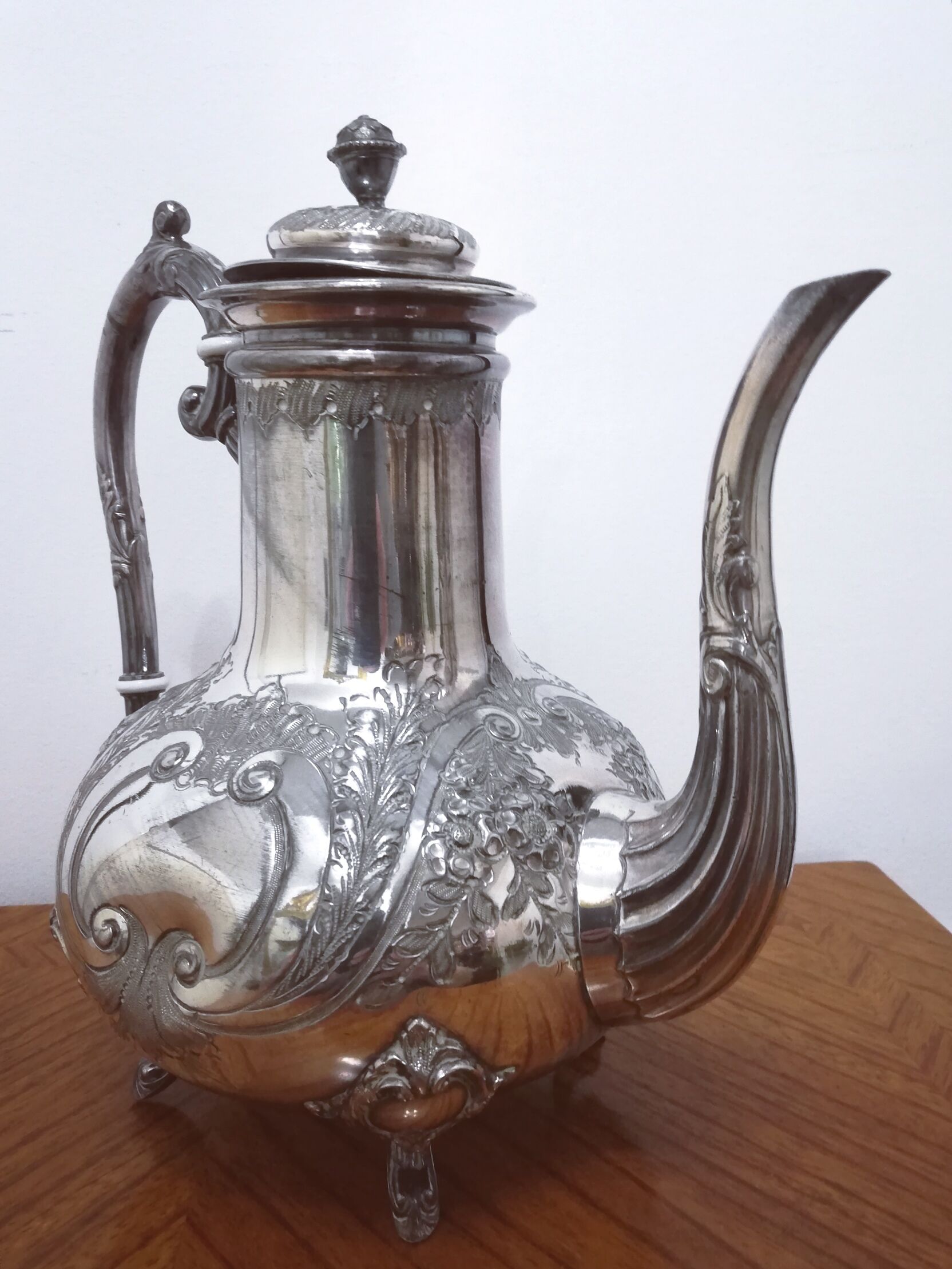 Silver metal teapot in Louis XV style