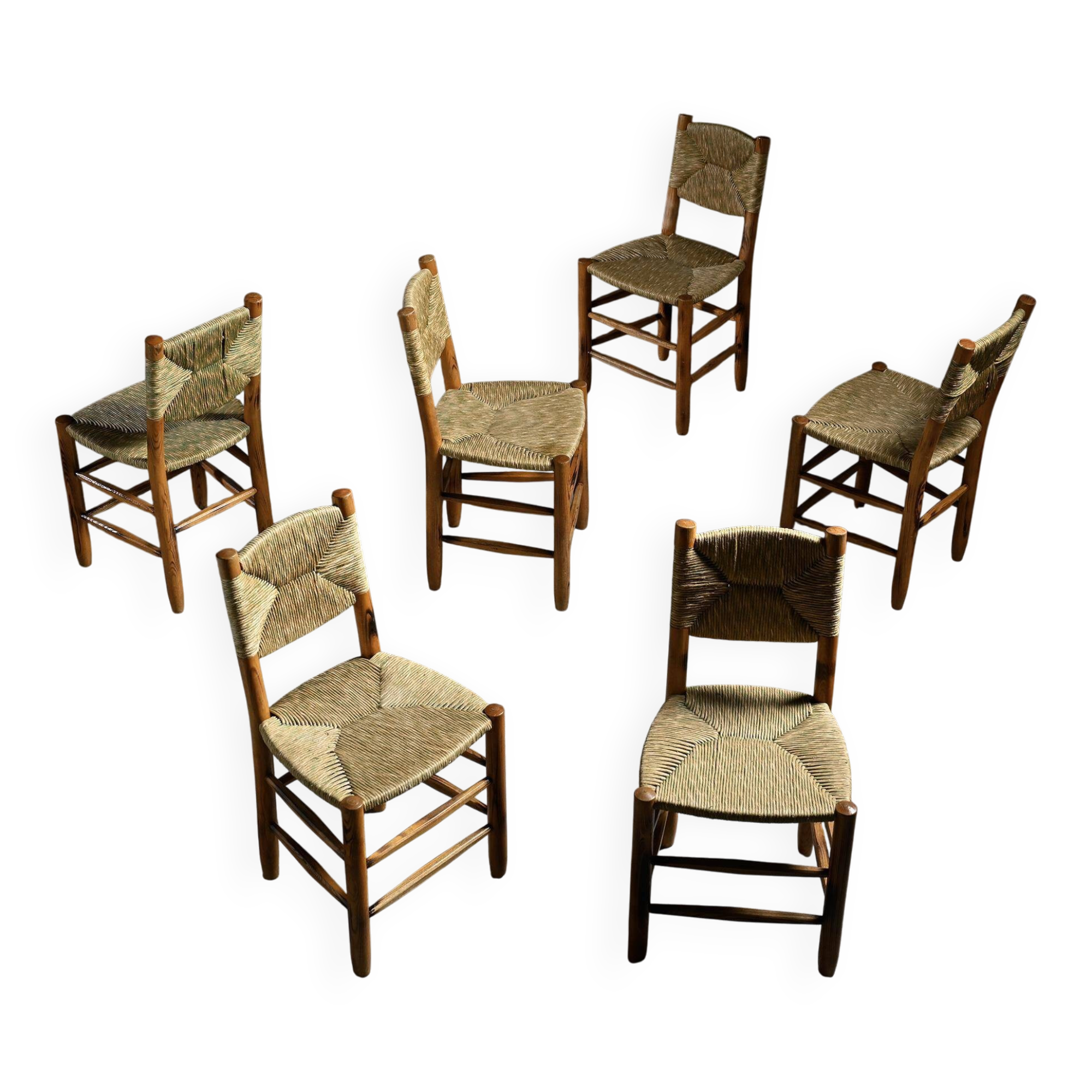 Set of 6 Bauche model chairs by Charlotte Perriand, circa 1960.