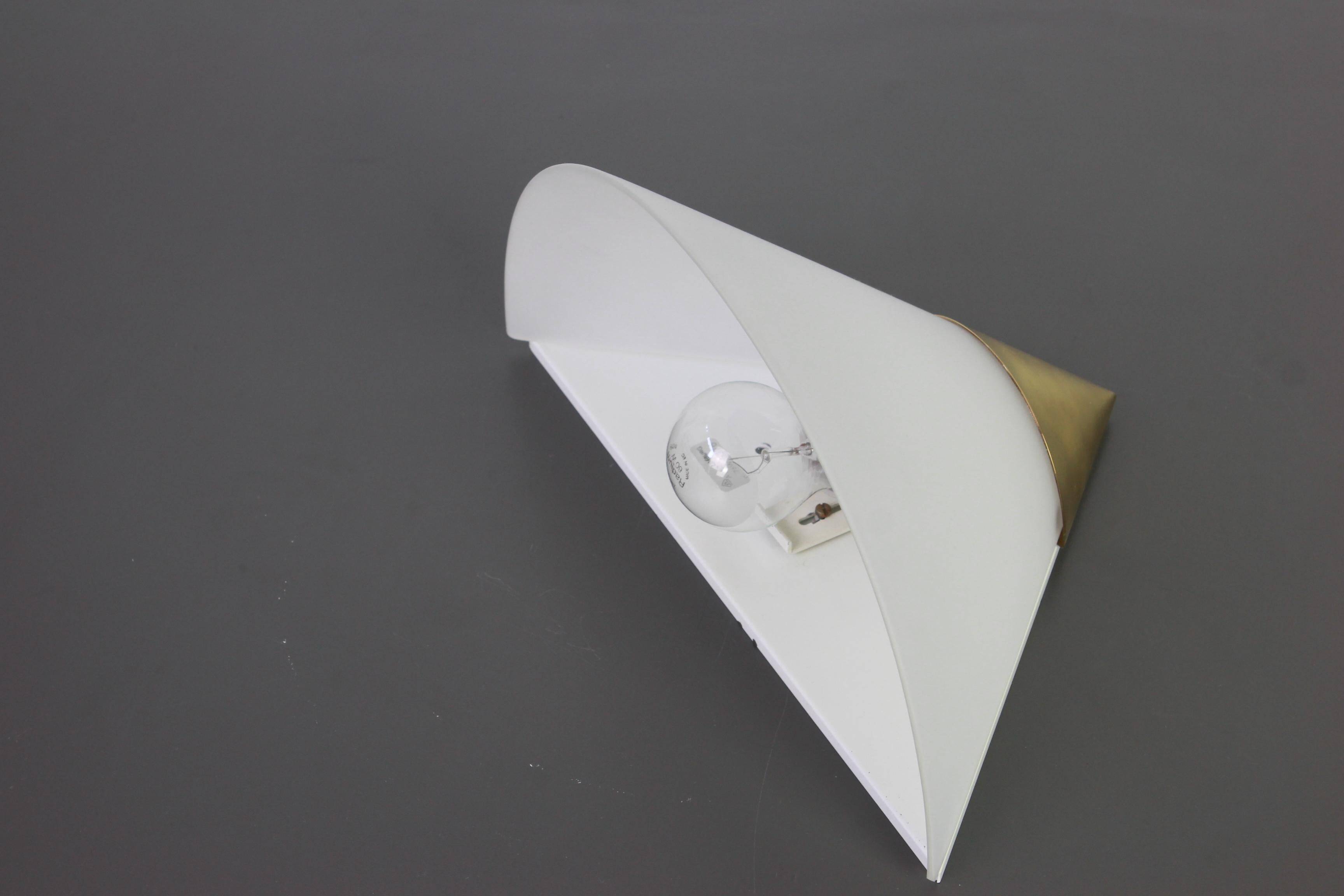 Pair of opaline glass wall lights designed by Limburg, Germany.