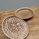 A trompe l’oeil strawberry pie dish