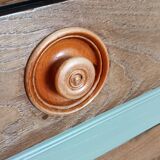 Buffet made of natural wood and bronze green.