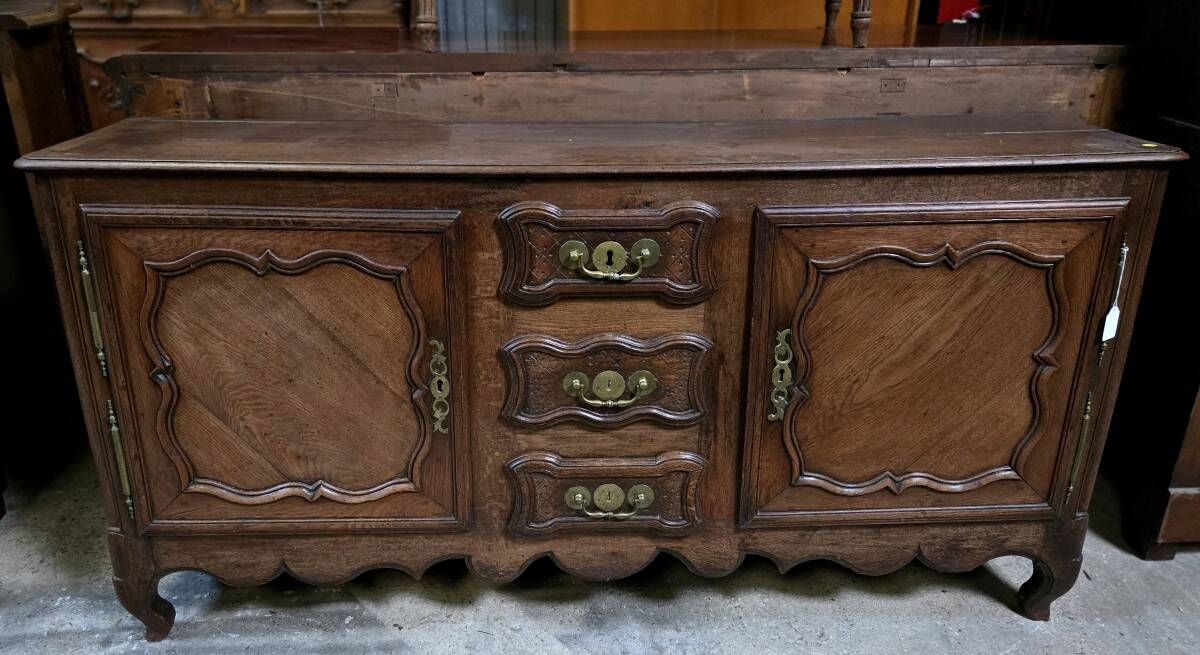 Louis XV oak buffet in enfilade style.