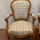 Paire de fauteuils de style Louis Philippe en hêtre teinté XX siècle