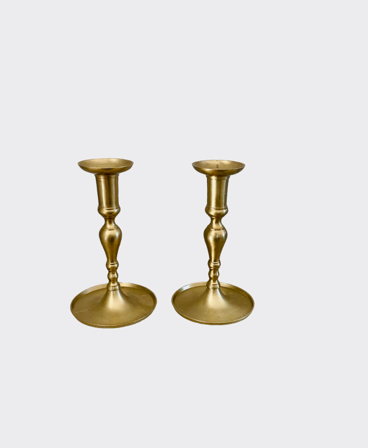 Pair of brushed brass candle holders