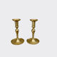 Pair of brushed brass candle holders
