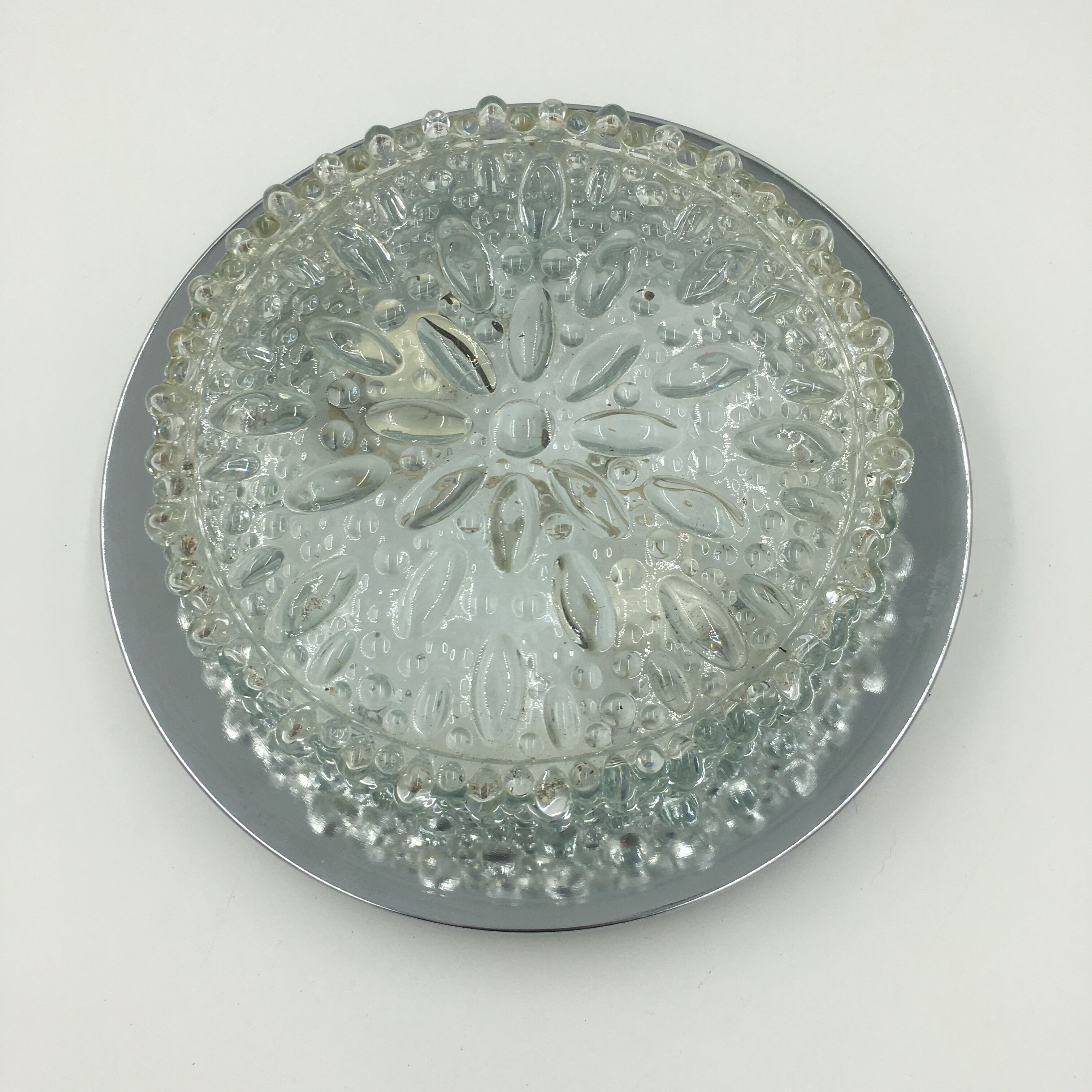 Round ceiling lamp in molded glass with relief