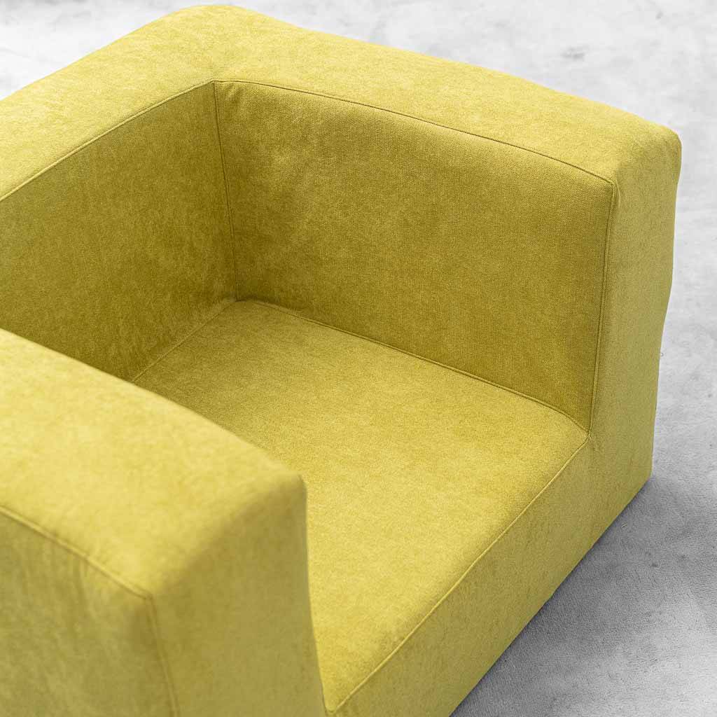 Vintage lounge armchair in lime green fabric – geometric design from the 1970s