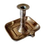 Antique metal and brass hand candle holder on rectangular base