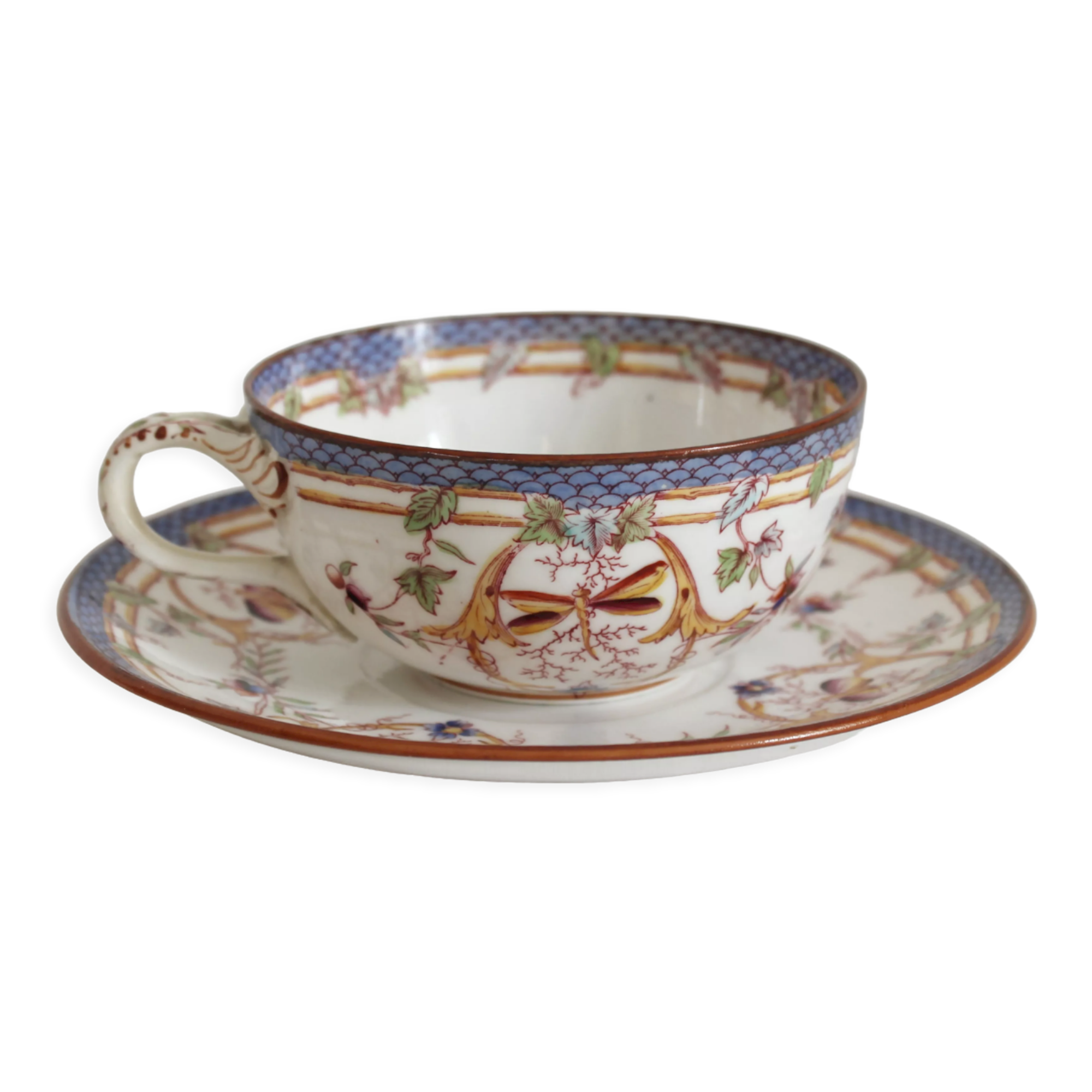 Tasse à café en terre de fer décor Minton mauve Sarreguemines fin XIXe
