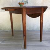 Round table at 2 vintage wood rabats