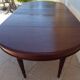 Table en acajou extensible  à 6 pieds fuselés et canelé style louis XVI