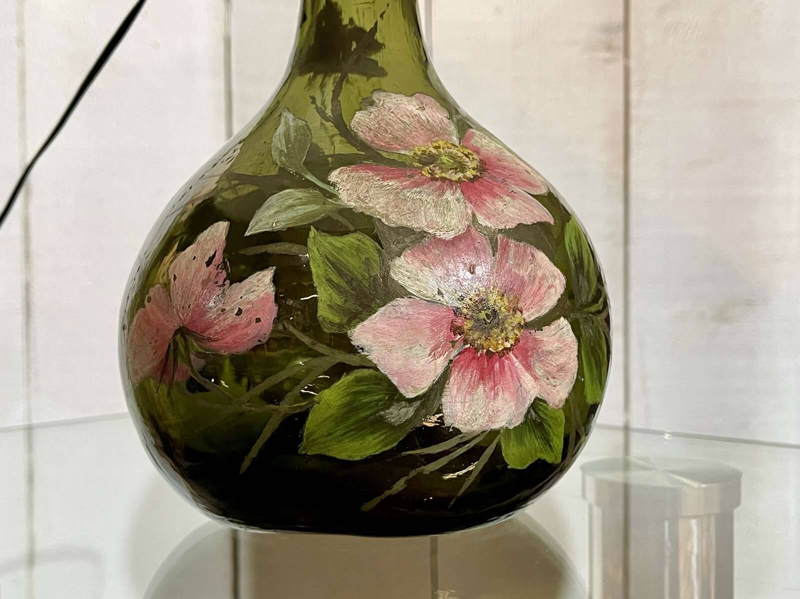 Blown glass lamp painted with a floral design, early 20th century.