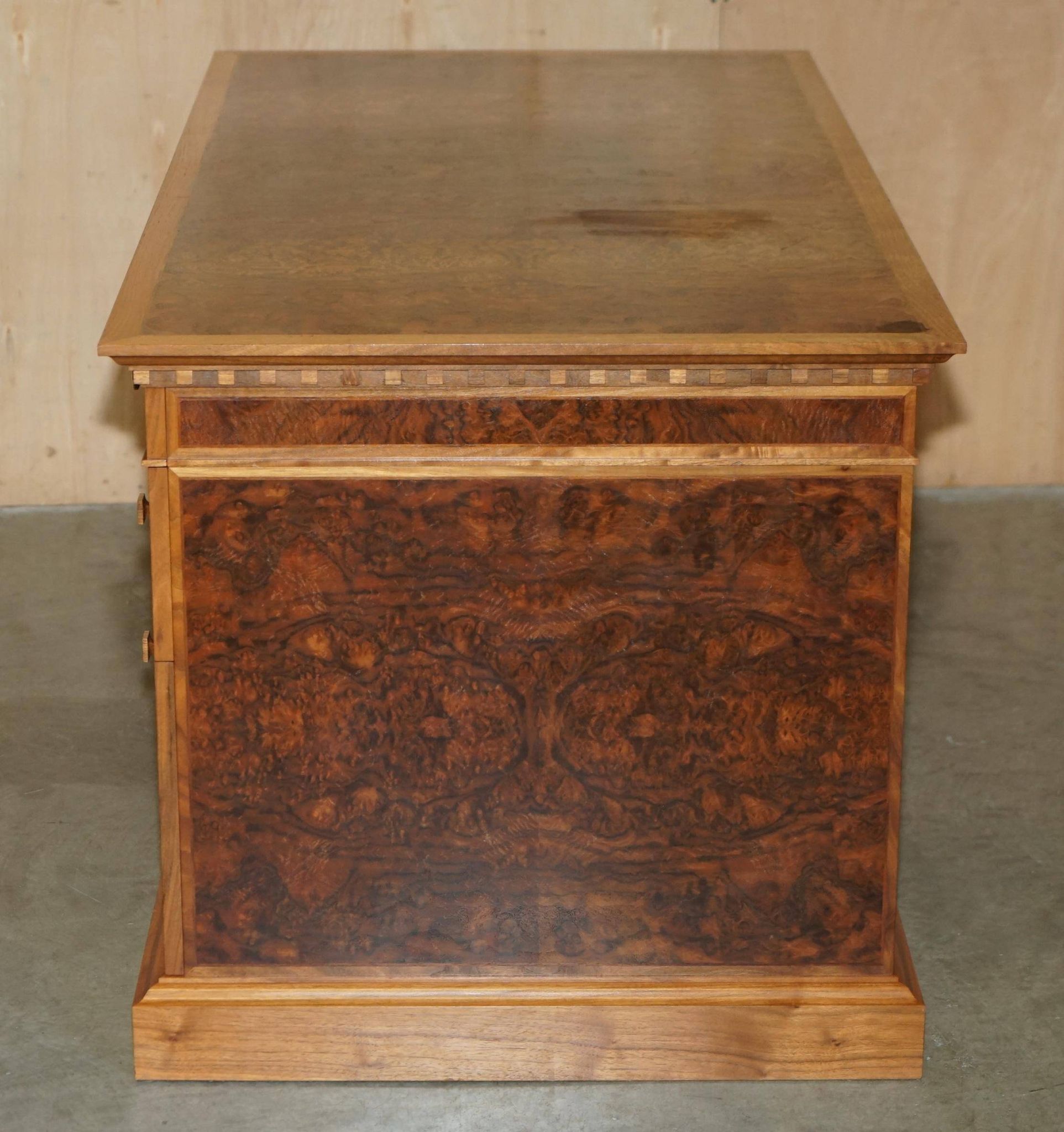 David Linley Burr walnut chest of drawers for light restoration.