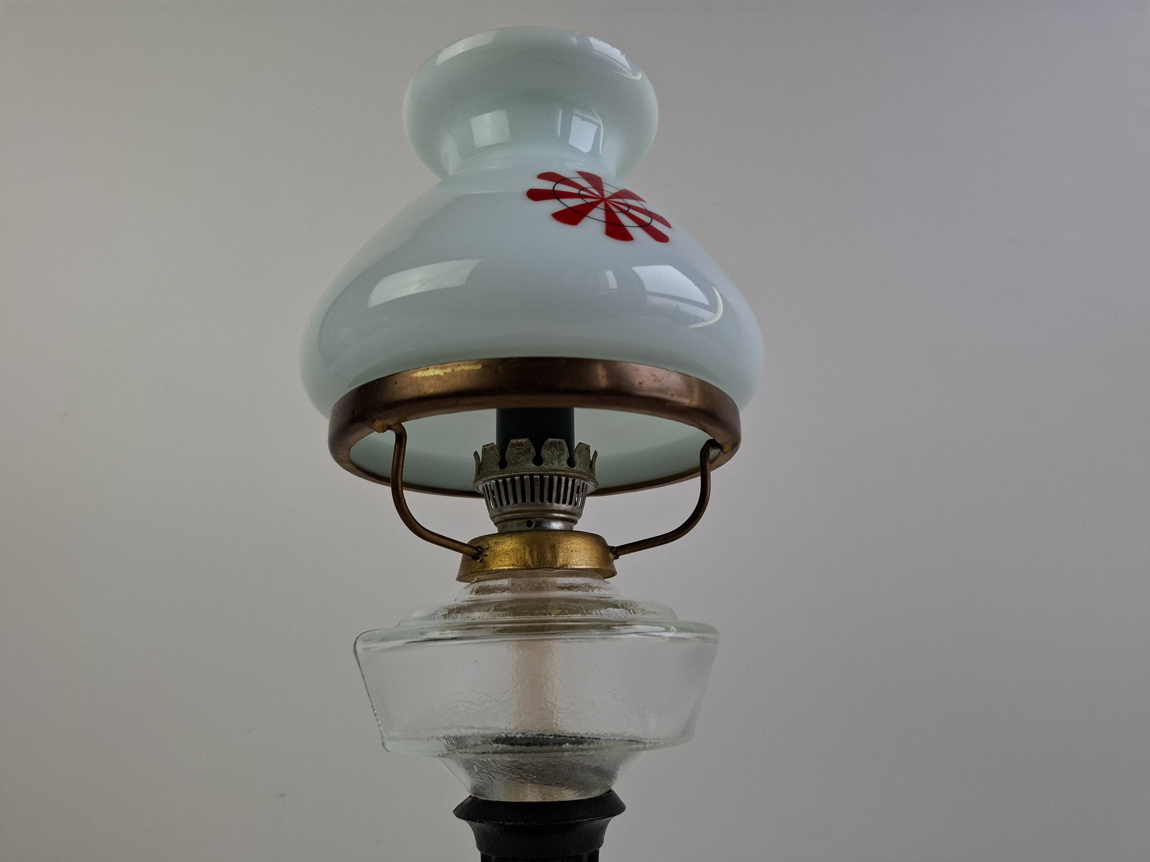 1960s Czechoslovakian milk glass oil lamp style table lamp with red windmill