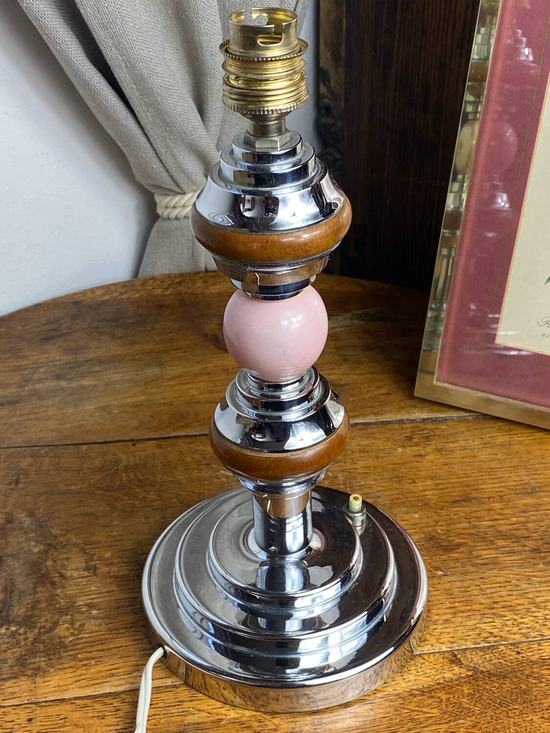 Lamp base in chrome metal, porcelain and wood.