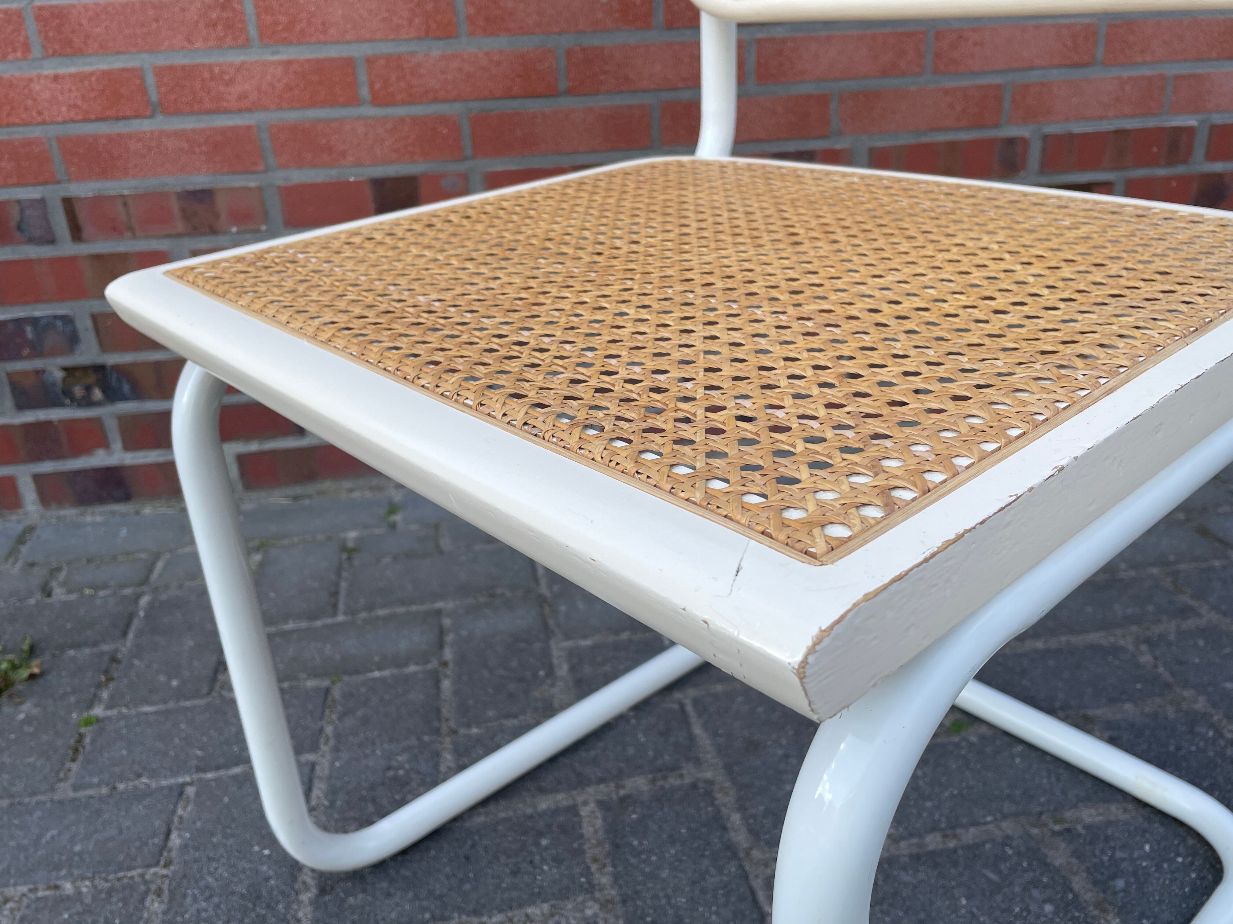 Cesca dining room chair designed by Marcel Breuer