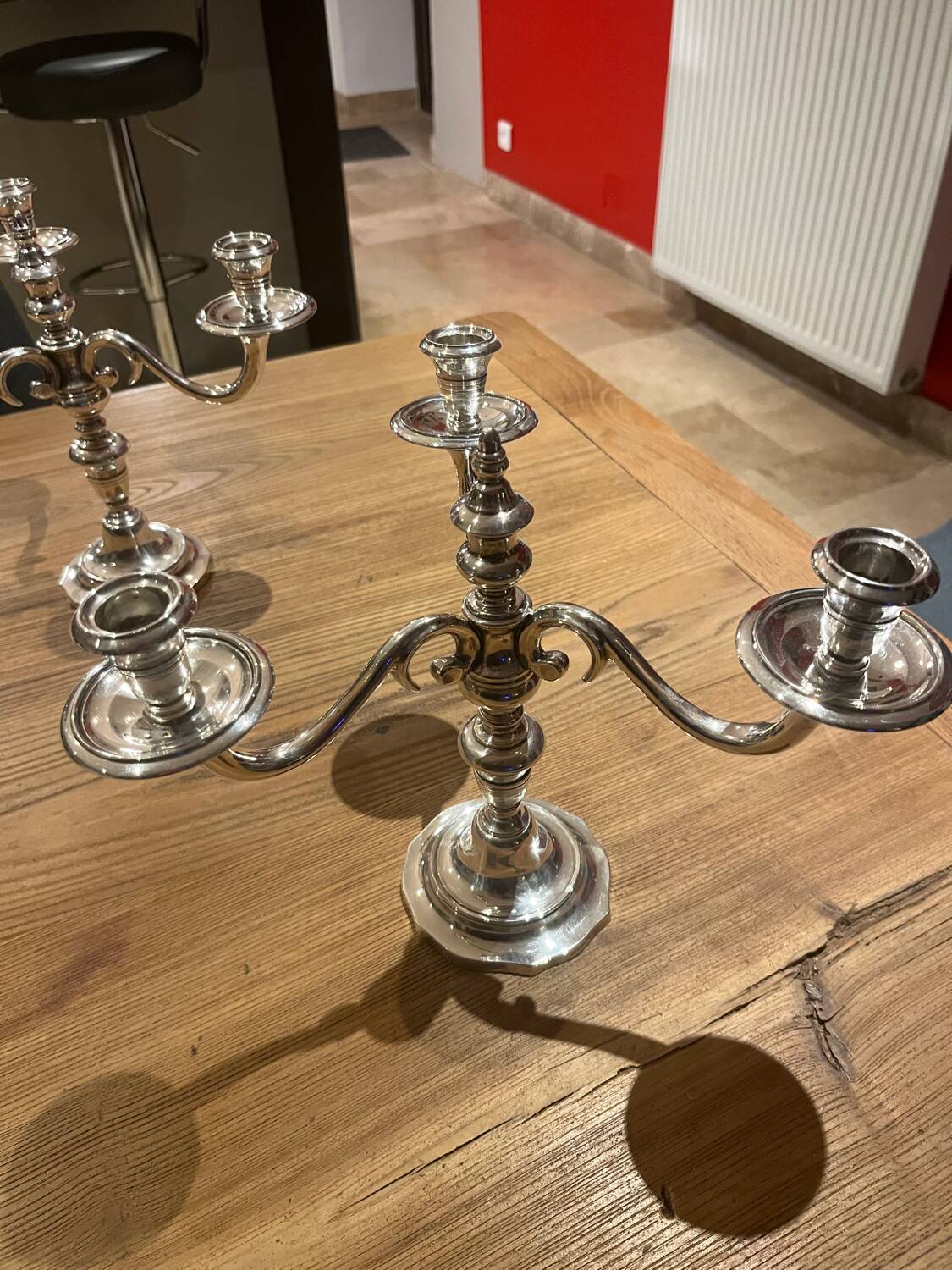 Pair of candelabra, three silver-plated metal lights