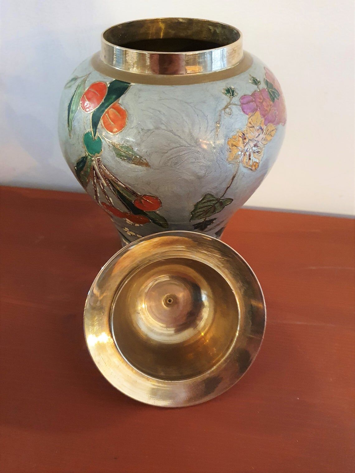 Golden brass urn